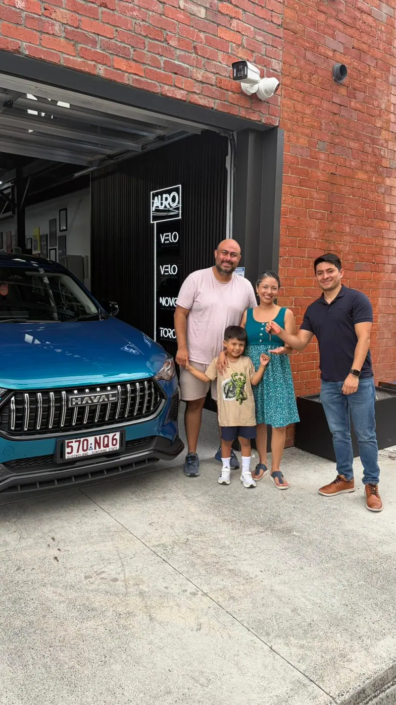 Family receiving their new car