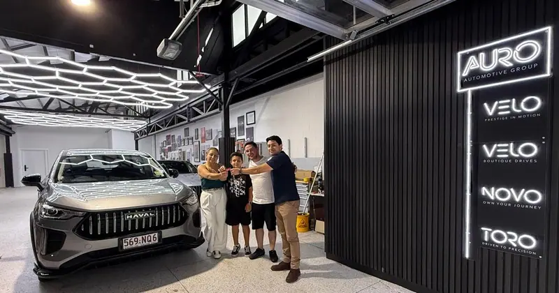 Family with their new Haval at AURO showroom